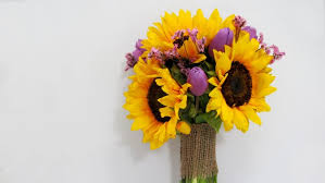These sunflower wedding bouquets and centerpiece details will fit right in with your summery, traditional affair. Sunflower Bouquet Tutorial Blooms By The Box