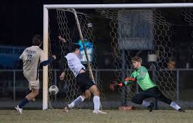 West Florida vs Gulf Breeze high school boys soccer action