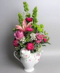 Celebrate Mother S Day With Gorgeous Flowers Arranged In A Keepsake Teapot Decorated With Lovely H Same Day Flower Delivery Flower Delivery Mothers Day Flowers