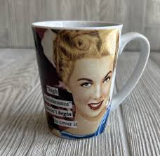 Anne Taintor “High Maintenance Doesn’t Begin To Cover It” Humorous Coffee  Mug