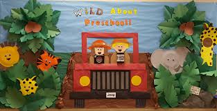 Wild About Preschool Jungle Themed Bulletin Board All Animals Made From Paper Plates Aug Jungle Theme Classroom Safari Theme Classroom Jungle Classroom Door