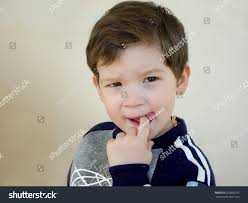 Caucasian Little Boy Finger His Tongue Foto Stok 629860793
