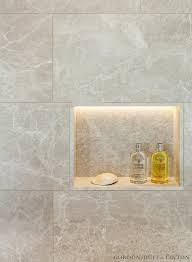 Natural Stone Marble Tiles In Bathroom Shower Niche With Led Lighting Detail Bathroom Lighting Design Shower Niche Modern Bathroom Design