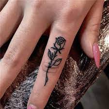 20 Pretty Rose Tattoo Ideas For Women To Copy 2020 Women Fashion Lifestyle Blog Shinecoco Com Finger Rose Tattoo Small Rose Tattoo Rose Tattoos
