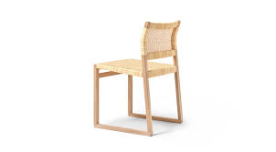 Each chair is crafted from a mindi wood frame that's durable with a light tone. Bm 61 Chair Cane Wicker Borge Mogensen Fredericia Furniture