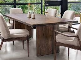 The dining room table is where friends and family come together over a bountiful meal to share stories, trade jokes and catch up. Four Hands Wesson Spalted Alder Gold Brush 94 Wide Rectangular Dining Table Fsuwes116