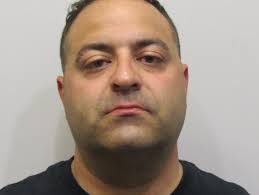 Ex-police officer charged with domestic violence