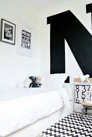 Black platform bed with white mattress inside bedroom 17. Black And White Kids Rooms My Paradissi