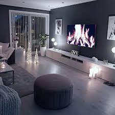 gezellige woonkamer donkere muur grijs taupe zwart lichte bank houten vloer laminaat cozylivingroom muur grijs gezellige woonkamer donkere muur