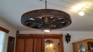 How To Make An Interesting Art Piece Using Tree Branches Ehow Diy Lampen Lampe Holzrad