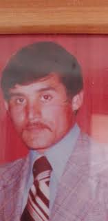 What tool can restore a face in an old group photo using a high-resolution  image of the face?