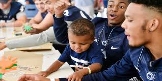 Penn State players 'engulf' children's hospital with energy, enthusiasm
