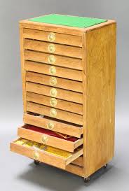 3.7 out of 5 stars with 7 ratings. An Oak Chest Of 12 Shallow Drawers Containing A 12th July 2017 Denhams