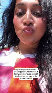 Girl with Hole in Jeans in Front of Her Houde