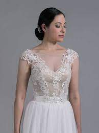 Courtney envisioned herself wearing a dainty and elegant dress, and that's exactly what she found at circle park bridal boutique. Wedding Dress Topper Lace Top For Wedding Dress
