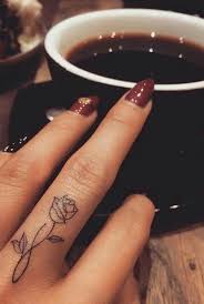 100 Trending Watercolor Flower Tattoo Ideas For Women Finger Tattoo Designs Finger Tattoos Tiny Tattoos