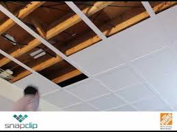 Take A Look At This Amazingly Simple Installation Process For Lowered Ceiling Installatio Low Ceiling Basement Basement Ceiling Basement Renovations