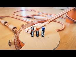 Simplest Electromagnetic Train Race Between Aa Batteries And Diy Simple Electric Train Youtube In 2020 Neodymium Magnets Electric Train Electricity