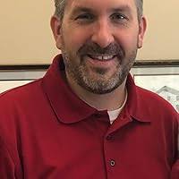 In the Name of God: The Colliding Lives, Legends, and Legacies of J. Frank  Norris and George W. Truett by O.S. Hawkins