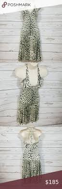 With stretchy material, the piece will effortlessly hug your figure and complement your silhouette, complete with a surplice neckline and gathered waist. Roberto Cavalli Leopard Halter Dress Leopard Halter Dress Asymmetrical Midi Dress Colorful Summer Dresses