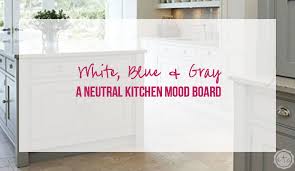 I do have my collection of cutting boards hanging next to the pantry door. White Blue Gray A Neutral Kitchen Mood Board Happily Ever After Etc