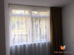 gordijnstof toppoint mori mat 24 mosterd vitrage holland haag super voile 20 confectie enkele plooi 12 cm rails goelst 440 gordijnstof houten vloer vitrage