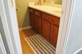 Baths, showers & toilets how to install a bathroom cabinet installing a wall cabinet provides extra storage for your bathroom. Wooden Cabinets Vintage Diy Painting Bathroom Cabinets