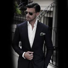1.that man is wearing a suit and tie.he.be stop manager. How To Wear A Suit Without A Tie 50 Fashion Styles For Men