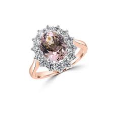 You found your princess, now guarantee that she'll say yes to your proposal with this unique ring. 18ct Rose Gold Oval Cluster Ring With A Light Pink Morganite