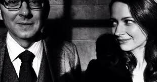 Michael Emerson as Harold Finch and Amy Acker as Samantha "Root" Groves