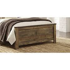 Made of replicated veneer and engineered wood, it's accented with burnished metal hardware and nailhead trim for a modern look you (or your kids) will appreciate. Ashley Furniture Signature Design Trinell Queen Panel Footboard Component Piece Brown Buy Online In Guernsey At Guernsey Desertcart Com Productid 54162016