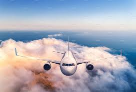 Airplane Is Flying Over The Clouds Aircraft Aerial View Clouds