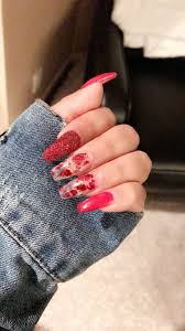 This one is a cute and fun manicure that works with color combinations and geometric shapes. Coffin Acrylic Nails Red With Glitter Nail And Manicure Trends