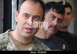 Petty Officer 1st Class Sam Allen, receives his diploma from NCO academy  Class 17-2 from Chief Master Sgt. Edward Walden, Sr., Commandant of the  Paul H. Lankford Enlisted PME Center, here, Feb.