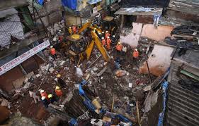 Building collapses on collins avenue near miami beach; Building Collapse Kills 11 After Monsoon Flooding In Mumbai
