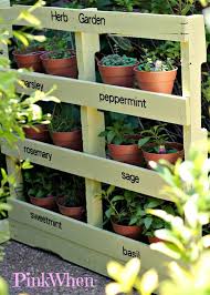 How To Make An Herb Garden From A Pallet Pinkwhen Herb Garden Pallet Pallets Garden Vertical Herb Garden