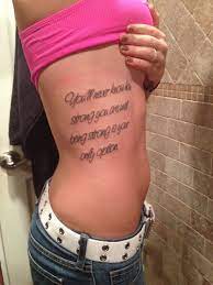 1 / 10 58 mandala wolf thigh tattoo Ribcage Quote Tattoo You Ll Never Know How Strong You Are Until Being Strong Is Your Only Option Tattoo Quotes Tattoos Cool Tattoos