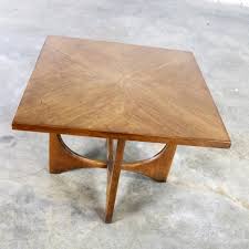 The table is round in shape and has the ability to separate and have the two leaves inserted to extend the length of the table. Walnut Mid Century Modern Square Side Table Lamp Table 6150 05 Broyhill Brasilia At 1stdibs