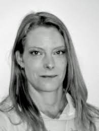 Can burning hair from a candle be harmful to cats?