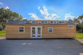 This simple yet modern shipping container home was designed by benjamin garcia saxe for the peralta family. 40ft Tiny House Built Using A Disguised Shipping Container
