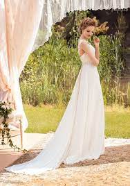 A guide to beach wedding attire tips for guests. 1454 Giuseppina Model Boutique Natalia Exclusif Bridalstore Wedding Robes De Ma Sophisticated Wedding Dresses Cheap Beach Wedding Dresses Wedding Dresses