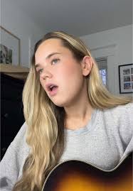 Girl Singing I Need You Now