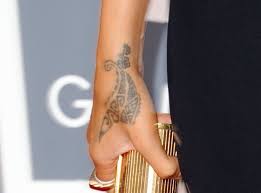 Rihanna has a discrete taste for tattoos and she knows where to place her tattoos to put them on display. A Guide To Rihanna S Tattoos Her 25 Inkings And What They Mean Capital Xtra