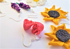 It is a synthetic, modeling clay product and can be molded until it is cured in the oven. 5 Flower Polymer Clay Earrings Designs Wearably Weird