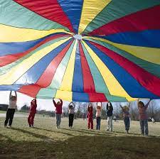 You Played With This Giant Rainbow Parachute In P E Parachute Games Pe Games Elementary Gym Games