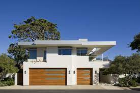 As you can see, the furniture both inside and outside the home is sparse which is standard in modern home design. Malibu Beach House 2 Starcon General Contractors