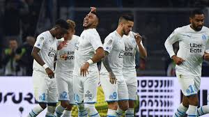 The ligue 1 game between lyon and marseille on sunday night was abandoned after former west ham midfielder dimitri payet was hit by a bottle . Var Changes Proposed After Marseille Lyon Controversy As Com
