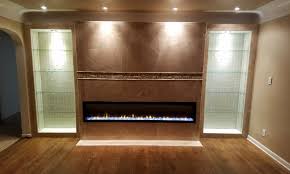 Laminate flooring on fireplace wall. Custom Project Dimplex Electric Fireplace Jackson Michigan Fireplaces And Inserts Gas Wood Pellet Electric Ann Arbor Saline Michigan