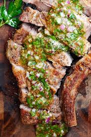 Lightly grease the air fryer basket with cooking spray. Air Fryer Pork Chops With Mustard Chimichurri Sauce Craving Tasty