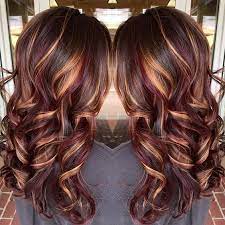 These sexy cinnamon curls are a stunning combo of auburn and brown hues! Fashionnfreak Light Brown Hair With Highlights